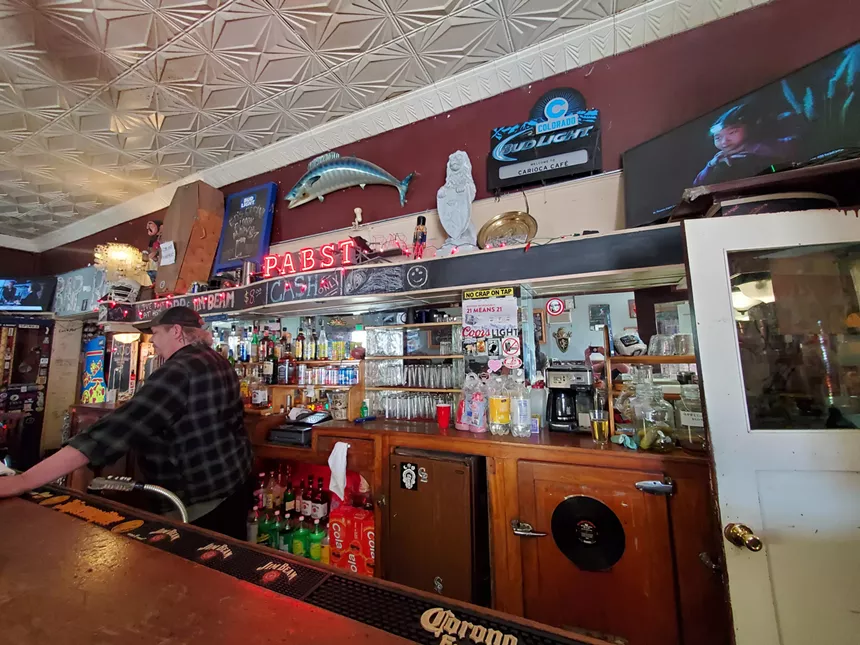 Originally from Texas, bartender Ed came into Bar Bar "upset and mad at the world" one day and "never left." - MOLLY MARTIN