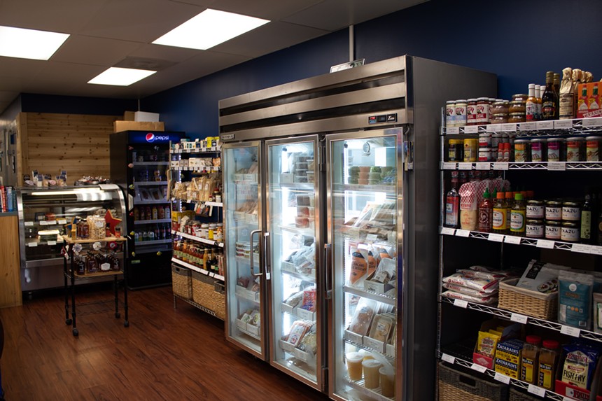 Since taking over in the summer of 2020, owners Maggie and Apos Kourakis have added shelves and freezers to the space, creating an international market.  - Nate today