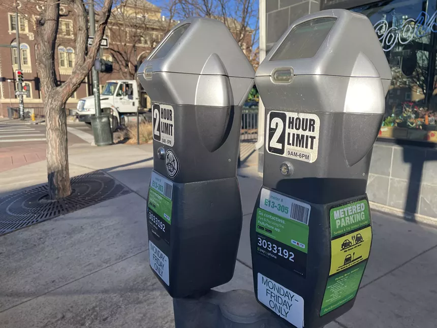 Parking meters situated in downtown Denver