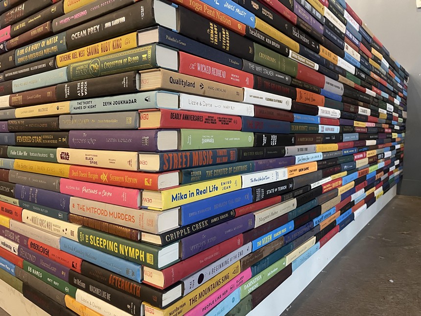 stacks of books on a shelf