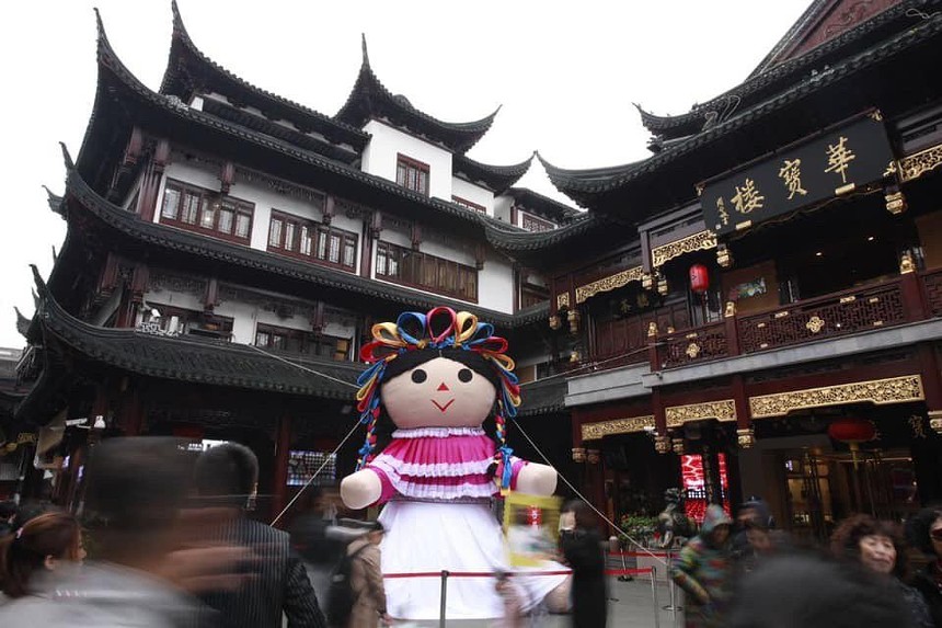The Lele doll sitting at Yu Yuan Garden in Shanghai, China in 2021.