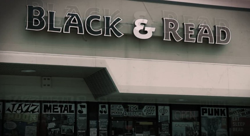 a sign that says Black & Read
