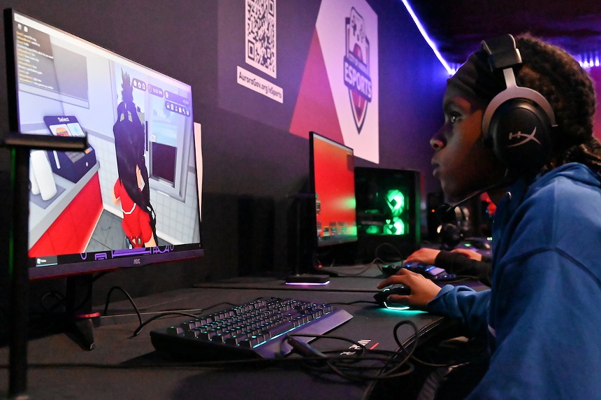 Amara Edwards plays video games on one of the professional PCs housed at Expo Recreation Center.