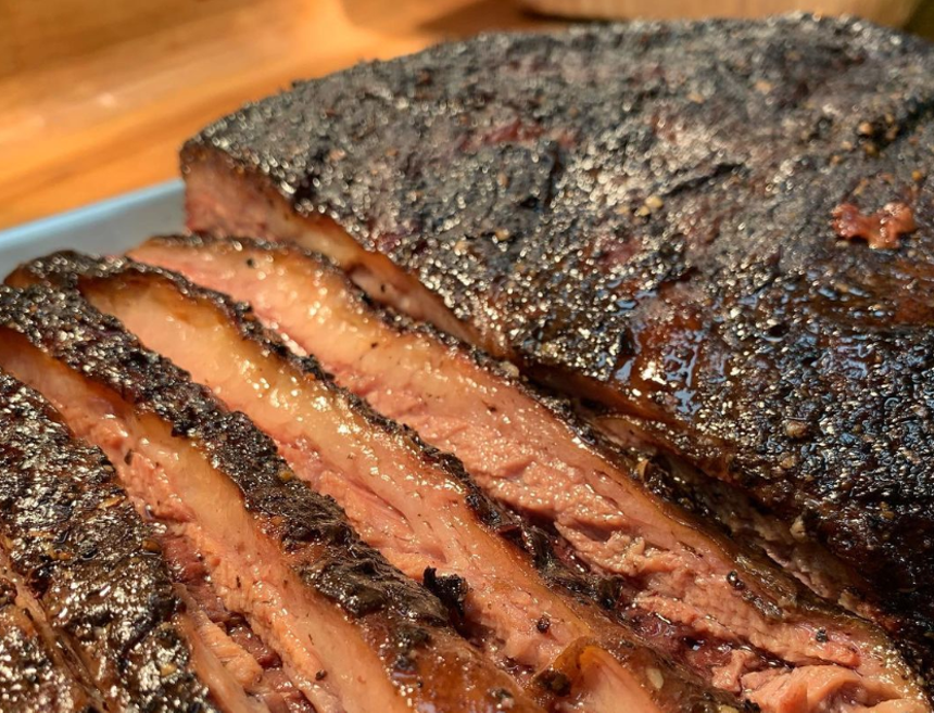 a close up of sliced smoked brisket