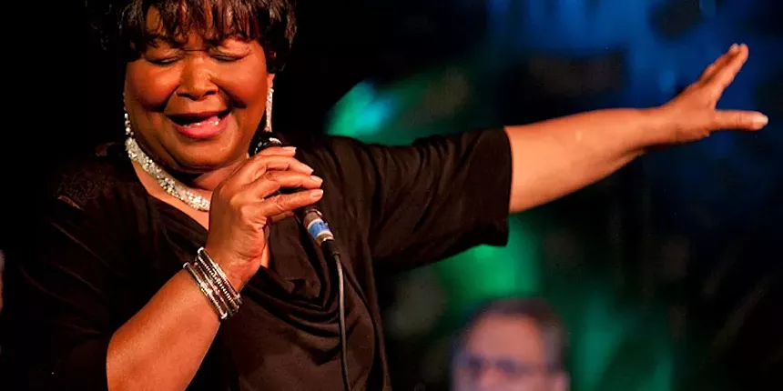 soul singer singing into microphone