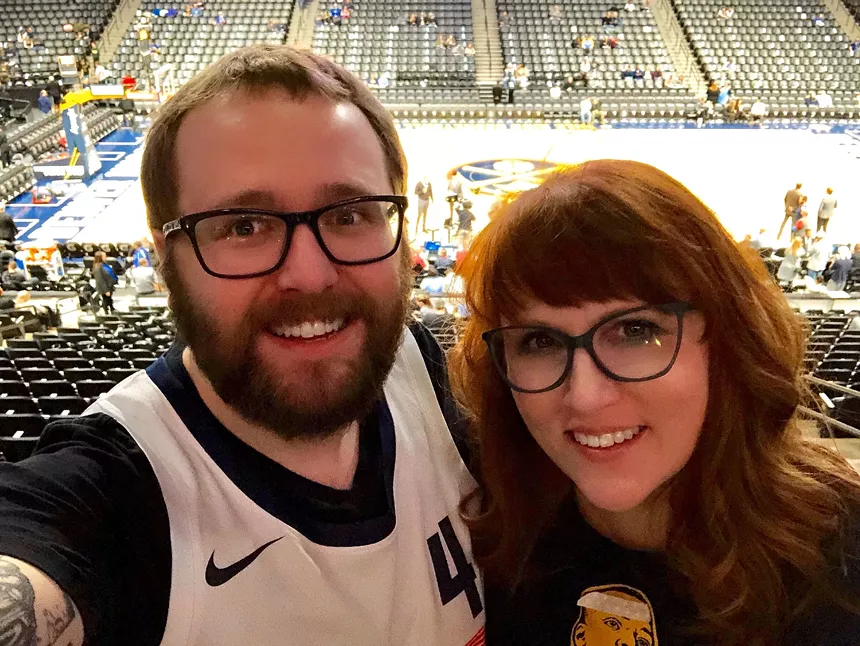 Laura Keeney and her husband Carson Pelo at a Denver Nuggets game.
