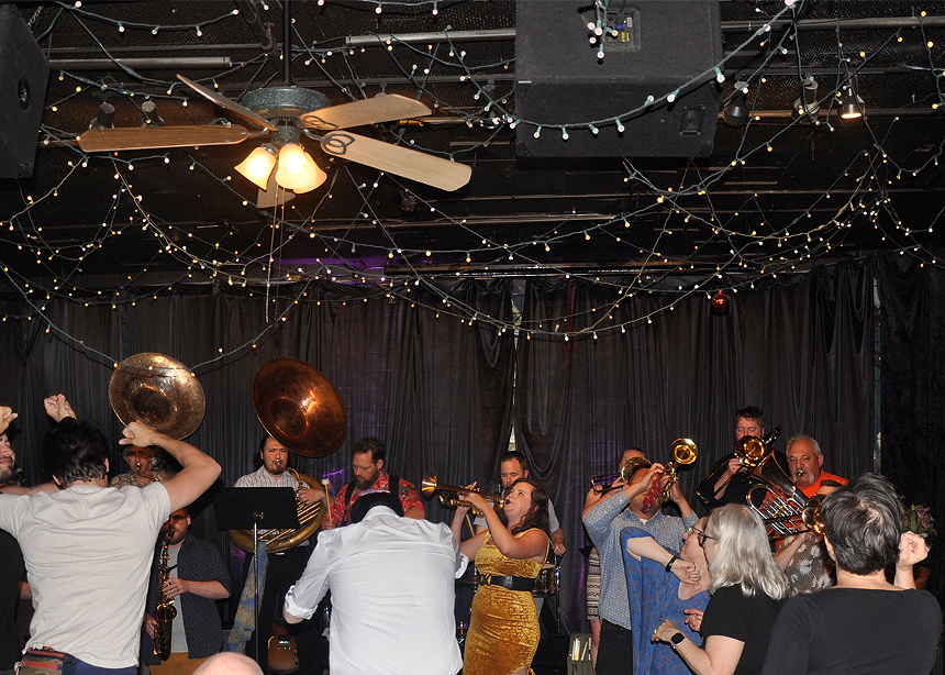 brass band plays in Mercury Cafe