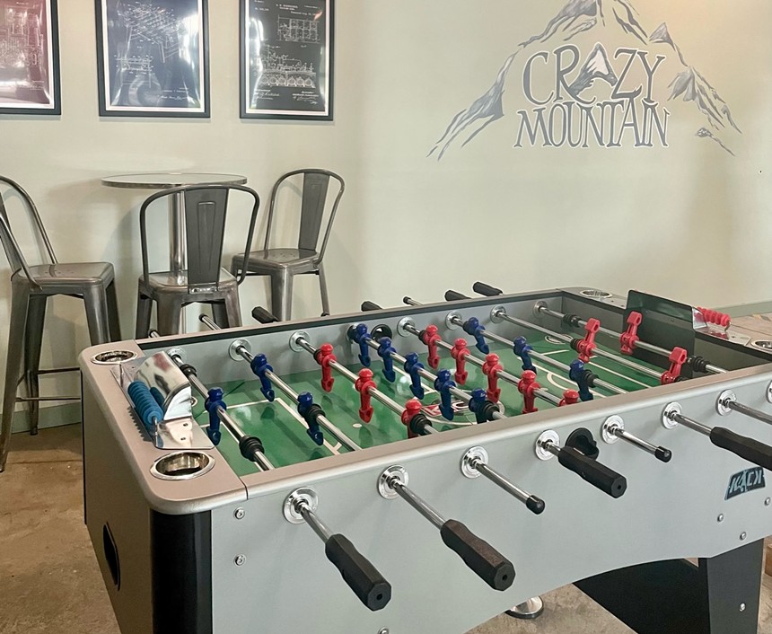Foosball table at a brewery.
