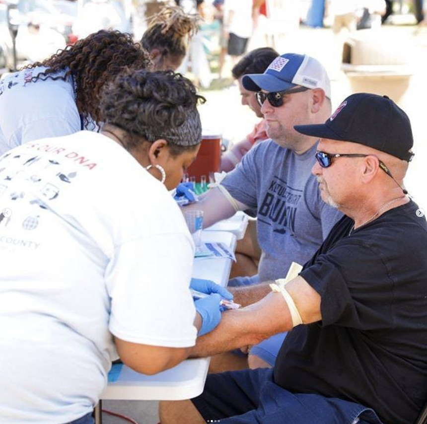 Older white male giving blood for tests.
