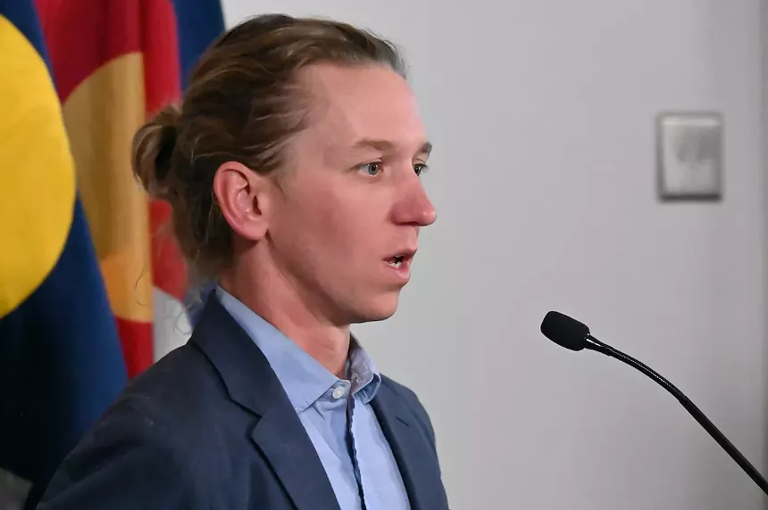 Cole Chandler, senior advisory to the mayor on homelessness resolution, speaks to reporters in the mayor's office on August 16.