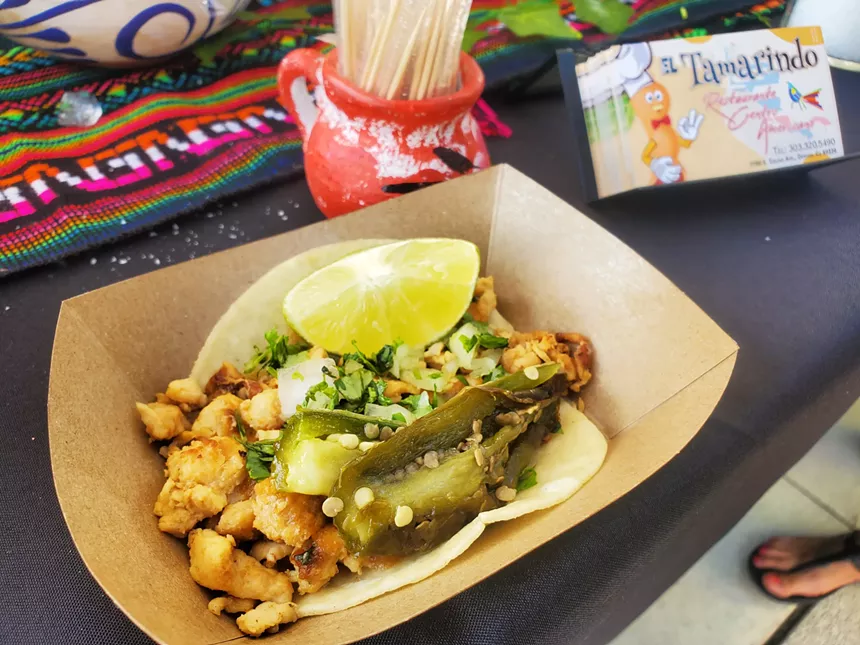 a taco with jalapeno and lime