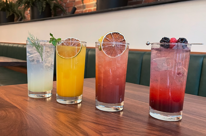 four different cocktails in a line