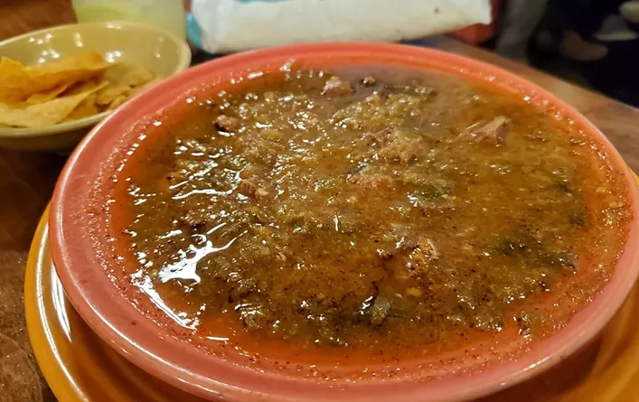 Green chile served with tortilla chips