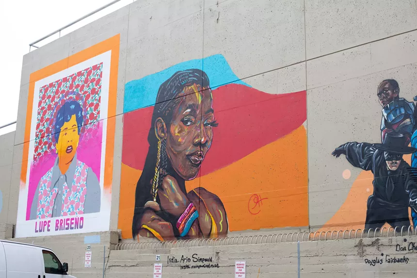 murals on parking lot wall.