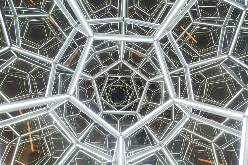 white and black pentagon patterns overlapping