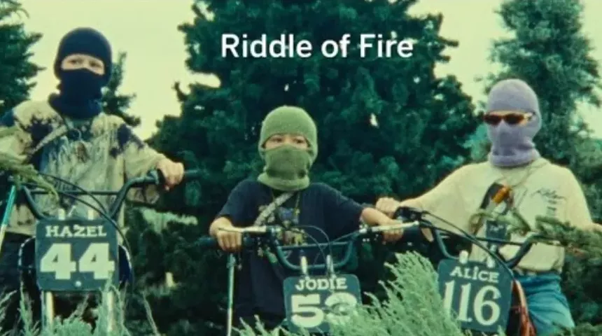a poster for the film Riddle of Fire