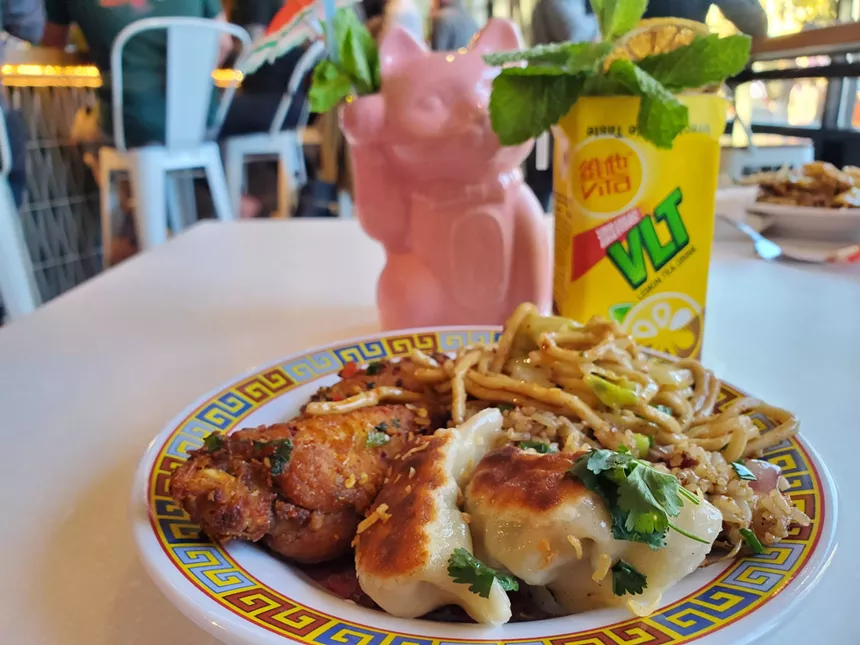 dumplings and wings on a plate