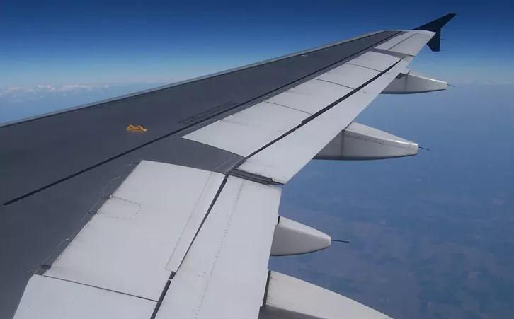 airplane wing in the sky