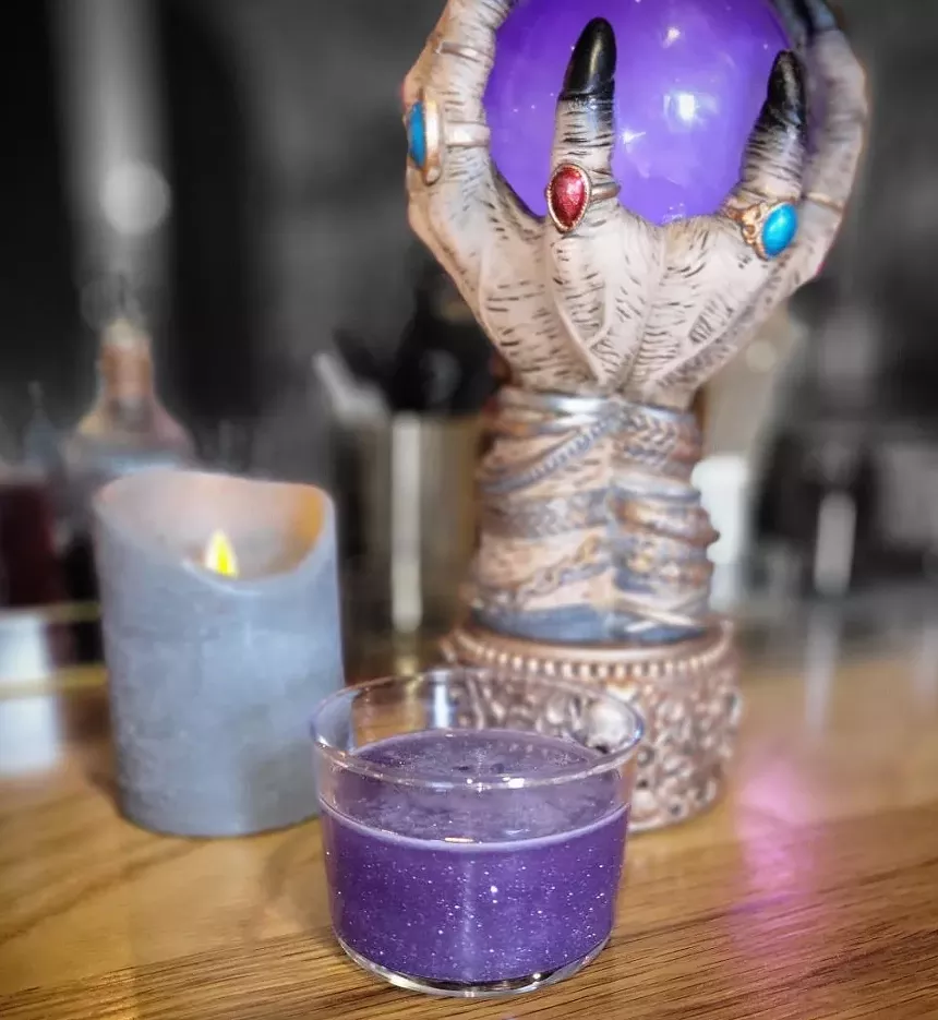 a glittery cocktail in a glass