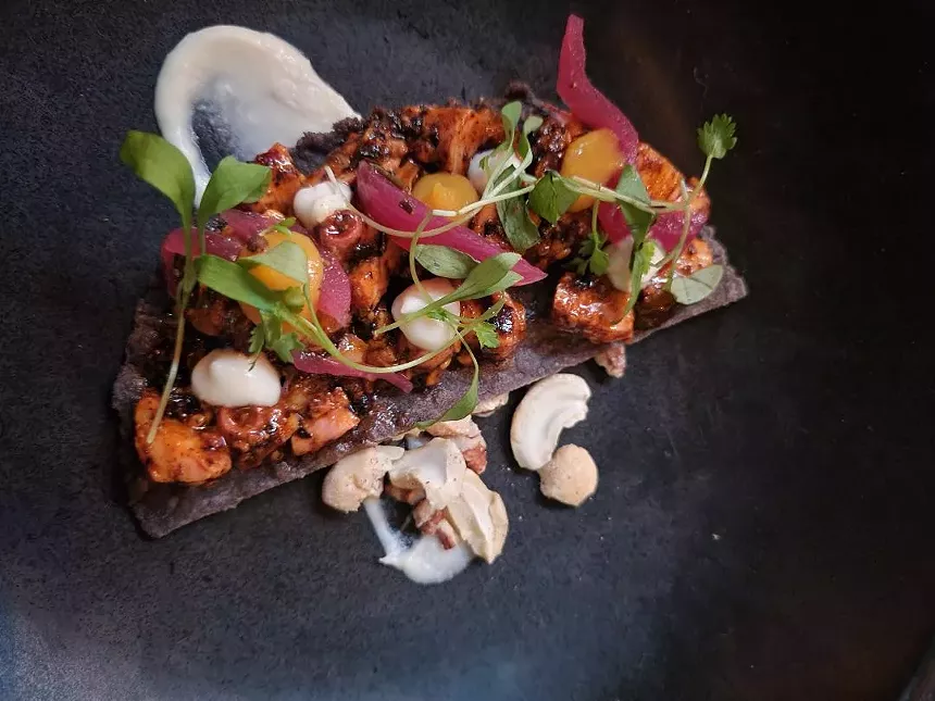 food on a black plate