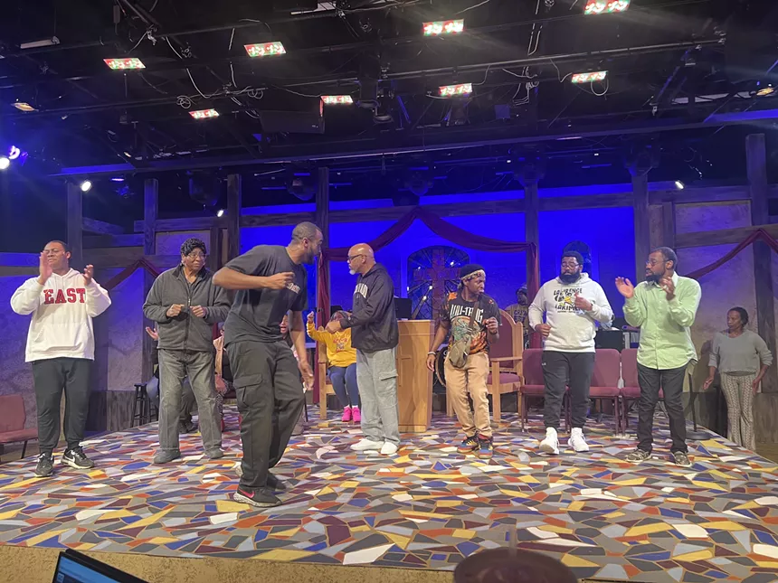 actors rehearsing on stage