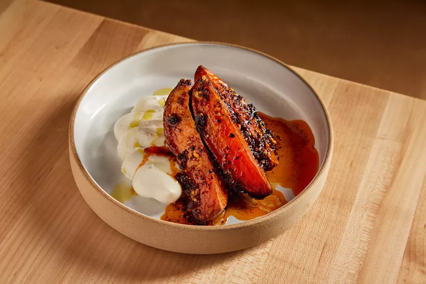 wedges of roasted sweet potato on a plate