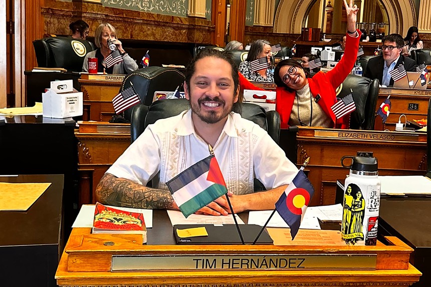 Representative Tim Hernández sits at his desk on the House floor.