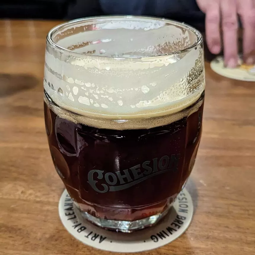 Beer with foamy rim.