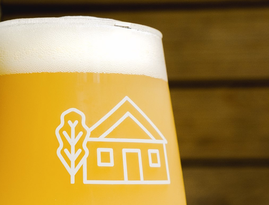 Close up shot of a hazy IPA beer with uniform bubbles.
