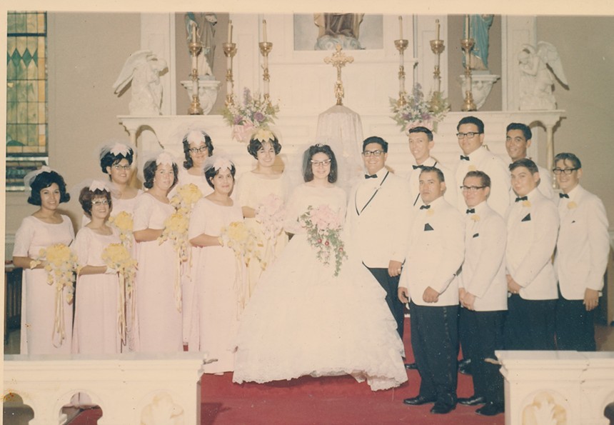 bride and groom in 1968 with wedding party