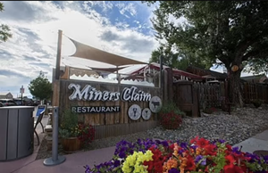 The sign for Miner's Claim Restaurant in Silt, Colorado.