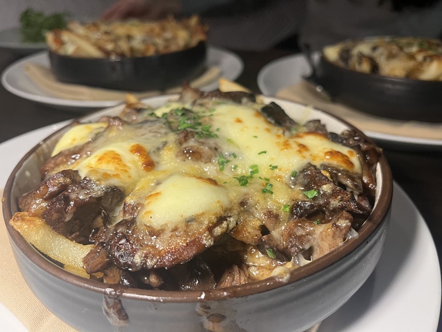 melted cheese and beef on fries