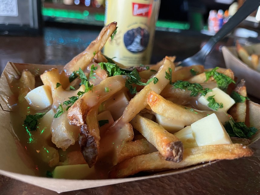 french fries with chunks of cheese
