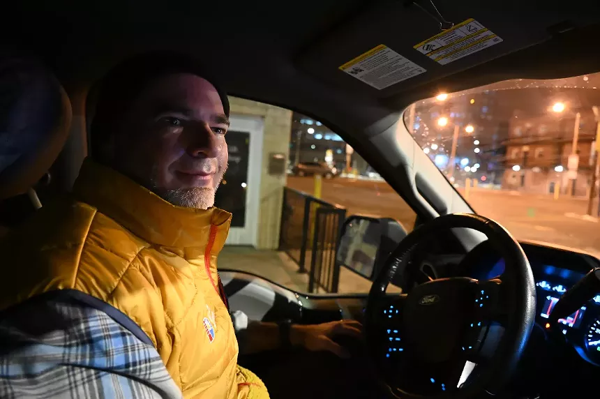 Chris Conner sits in his car.