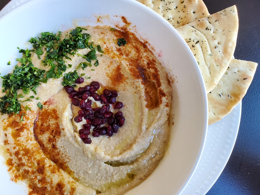a plate of hummus