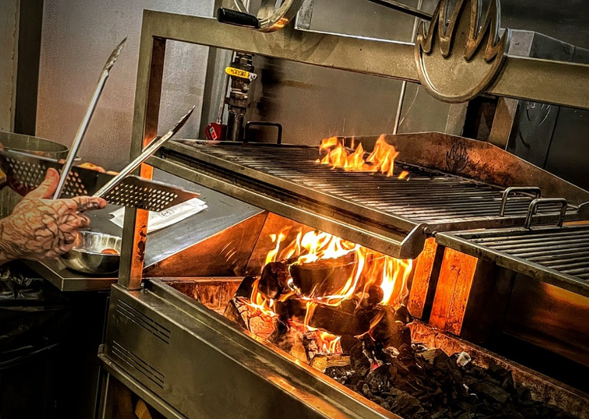 a fire in an indoor grill