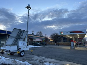 The DPD's surveillance tower at the 7-Eleven near Ogden Street.