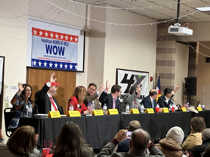 CD4 candidates raising their hands when asked if they had ever been arrested before.