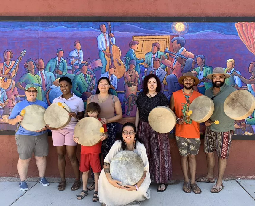 group of people smiling for a photo