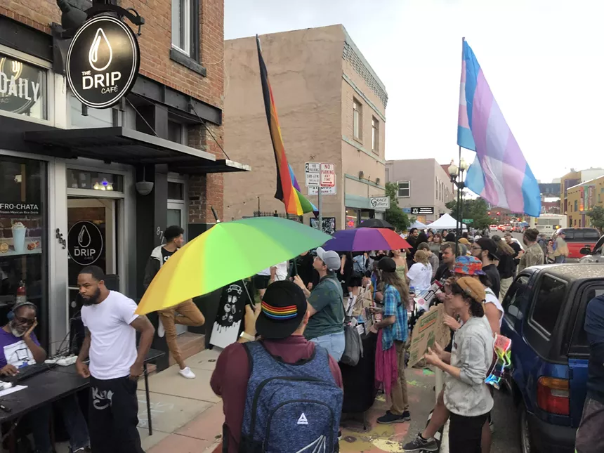 A protest outside The Drip Cafe in Denver, Colorado.