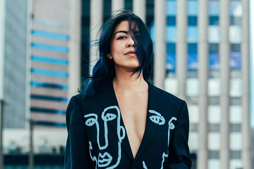 woman in a black suit jacket