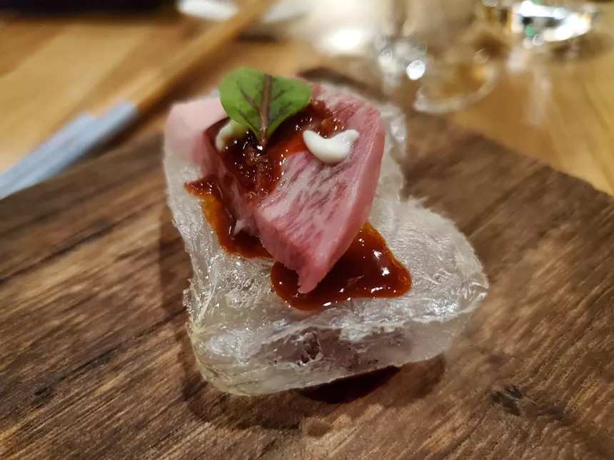 a slice of beef on clear bread