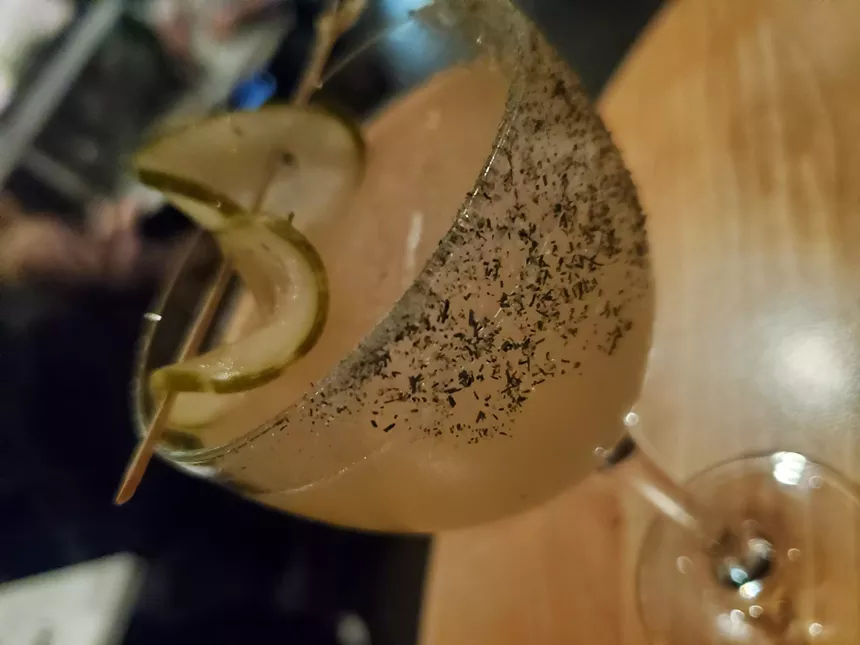 a cocktail in a coupe glass