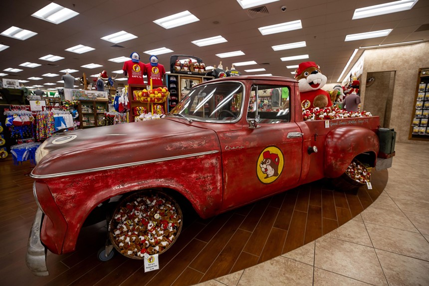 a red truck inside a store