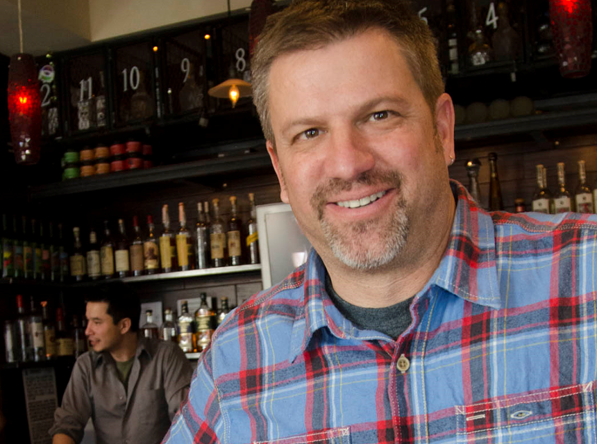 a man in a plaid shirt