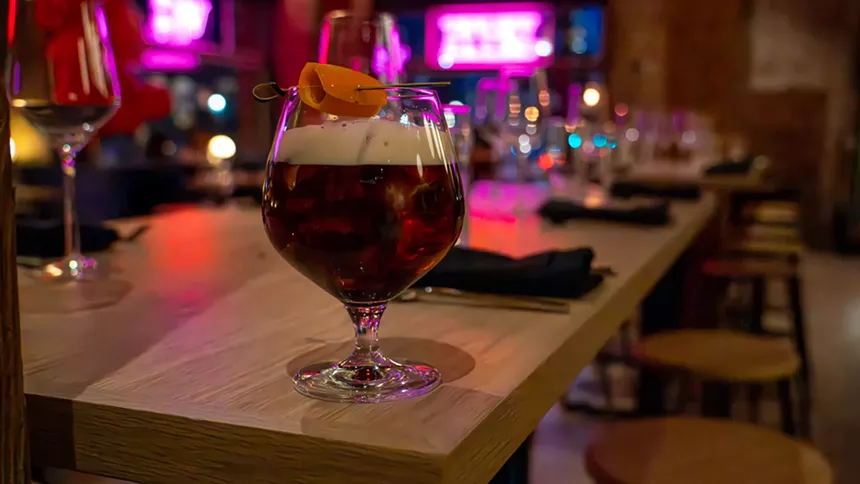 a cocktail in a glass on a table