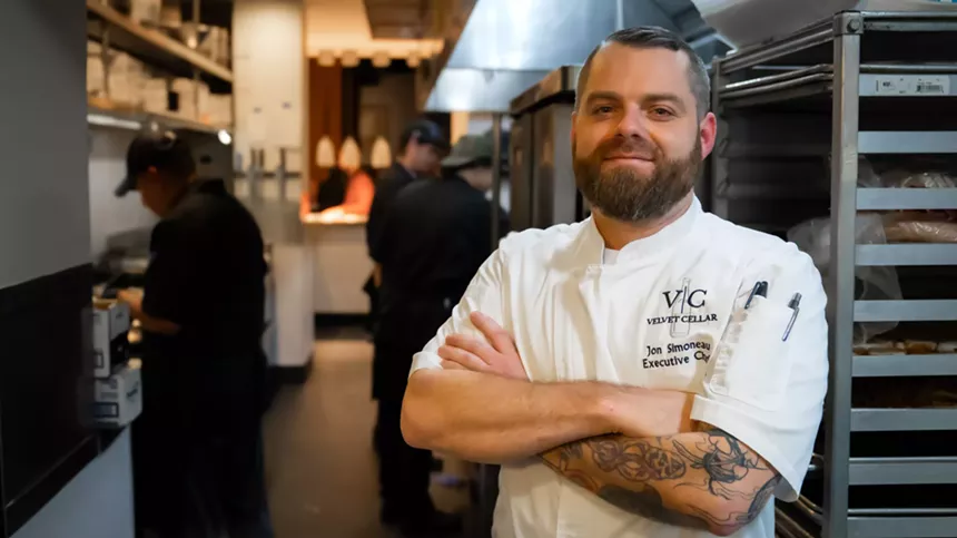 man in a white chef's coat