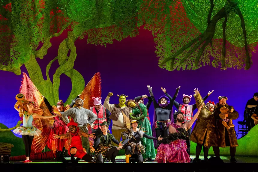 actors in Shrek the Musical on stage.
