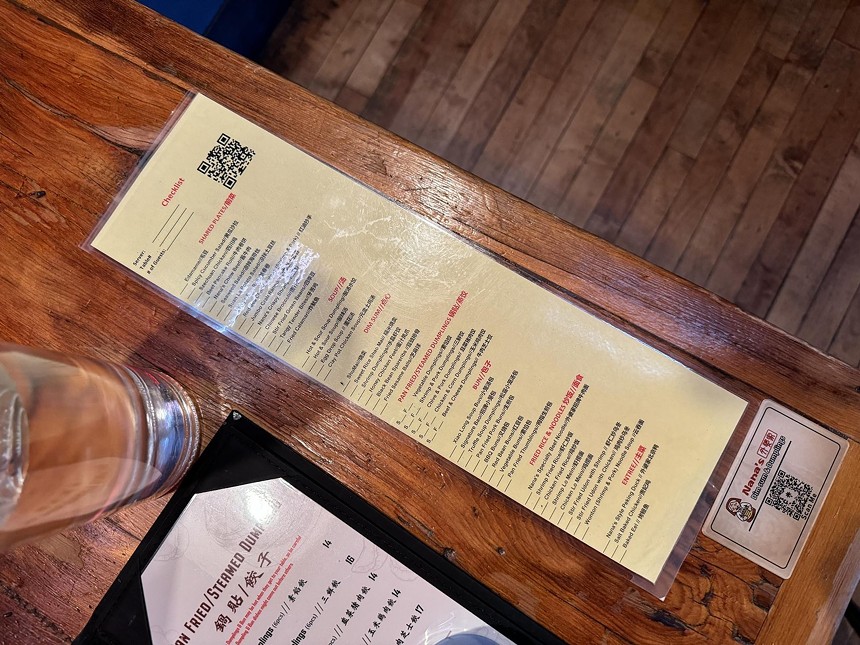 a laminated menu on a table