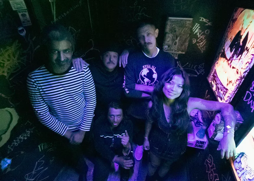 bandmates pose for a picture